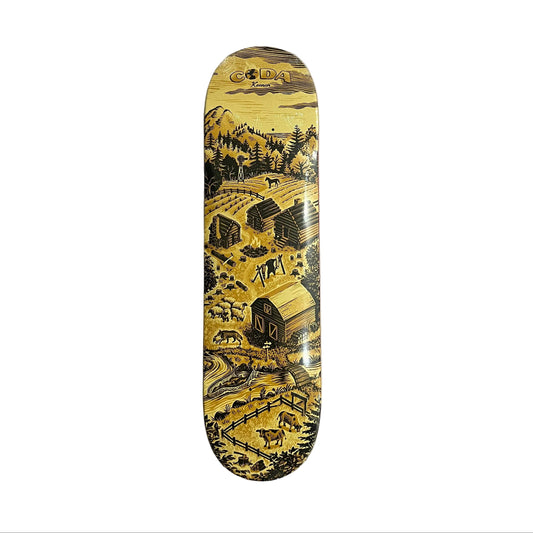 A skateboard deck with a detailed vintage-style farm illustration in yellow, brown, and black, featuring the brand name 'CODA on the top, photographed on a white background