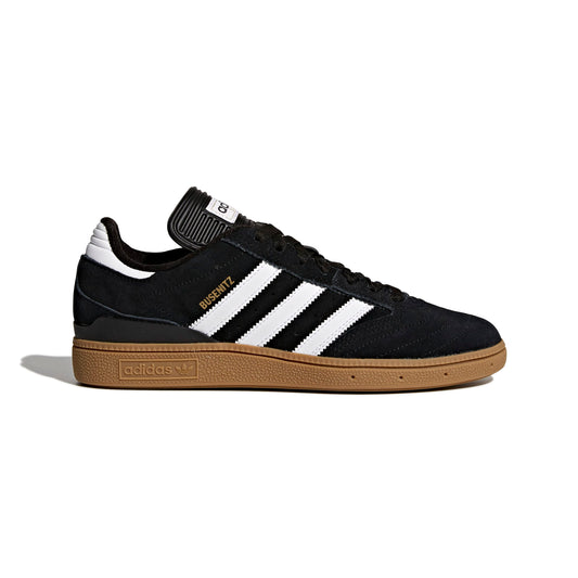 side view of black suede soccer inspired skateboard sneaker with gum rubber outsole