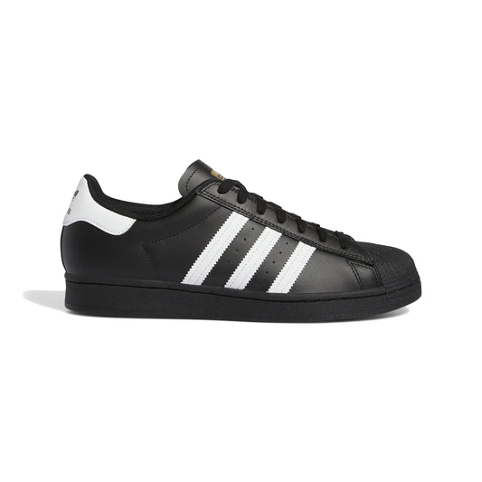 side view of black leather adidas superstar with white stripes and heel tab