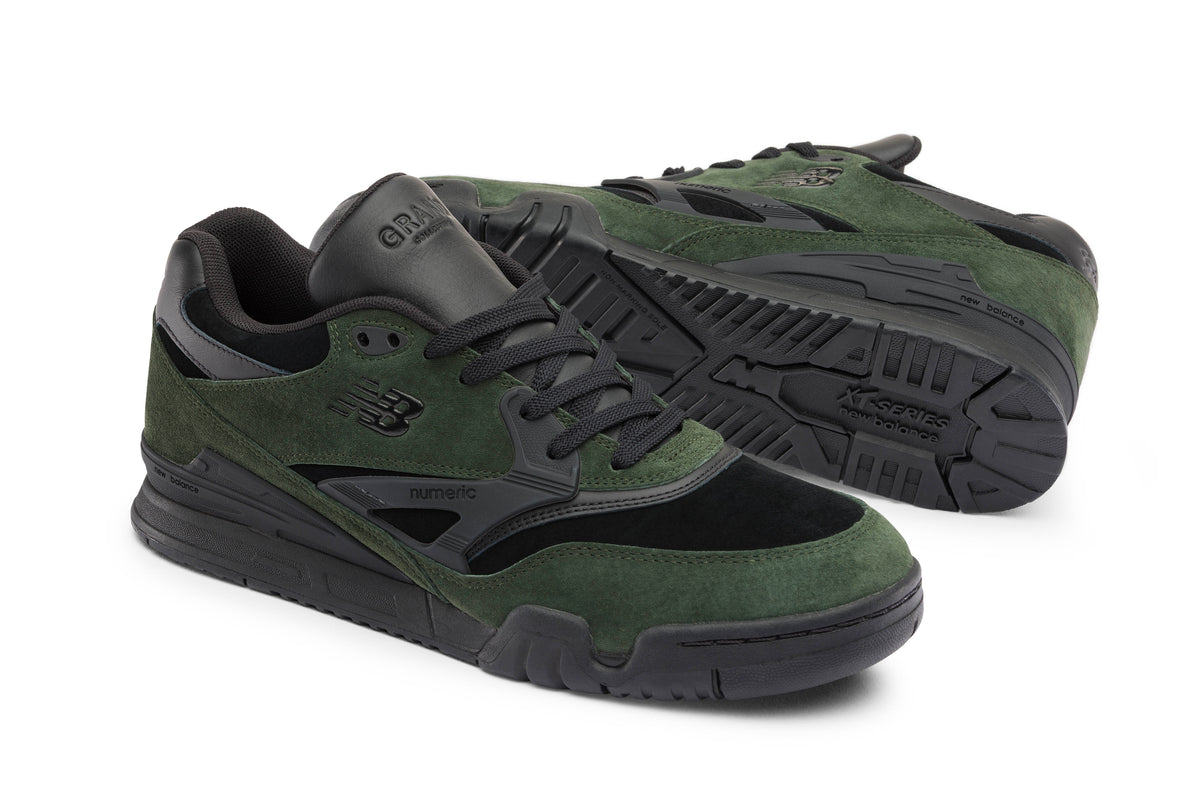 A pair of New Balance 770 sneakers in olive green suede and black mesh, shown from the side and sole views on a white background.