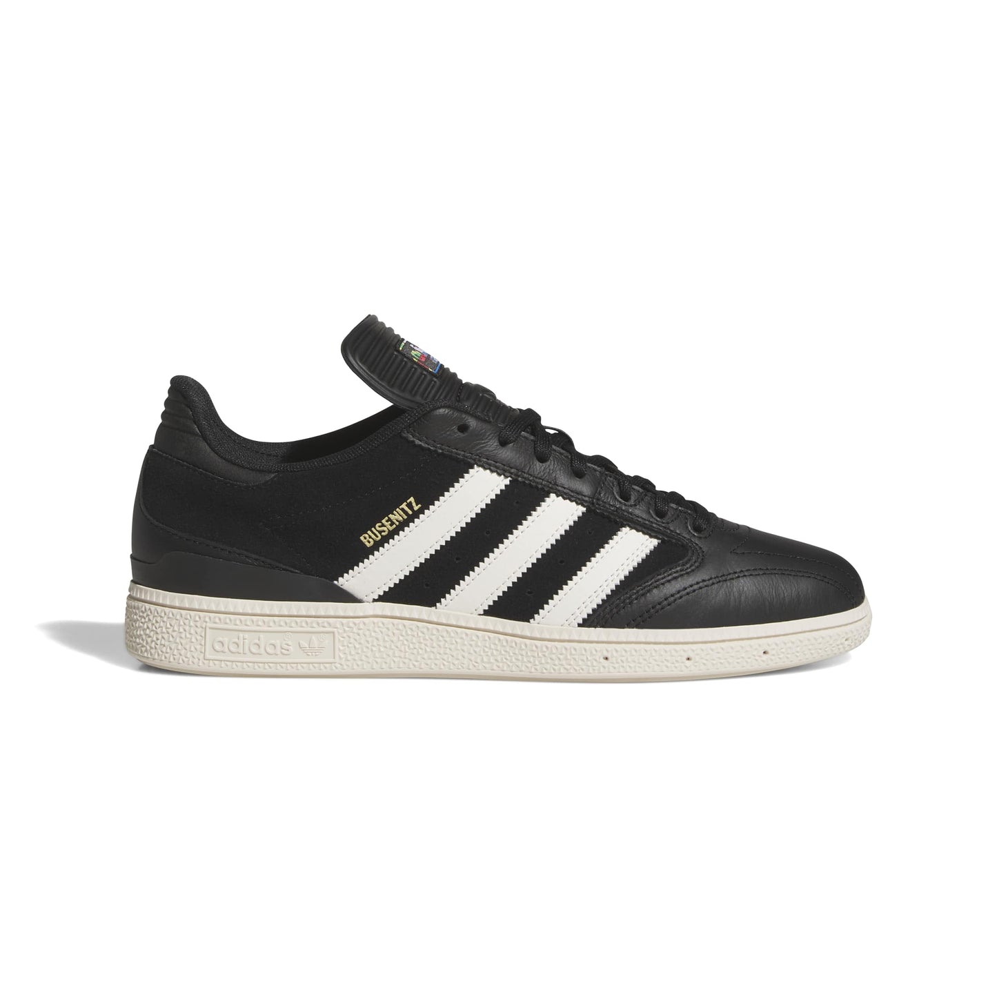 Black adidas  sneaker with white accents on a white background