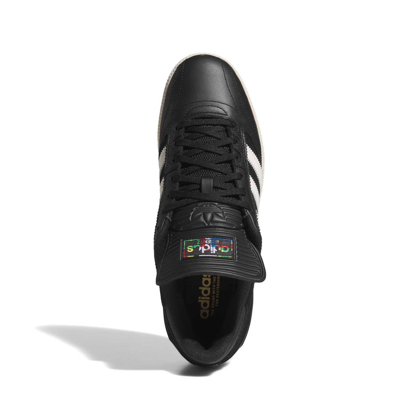 Black Adidas sneaker with white stripes on a white background
