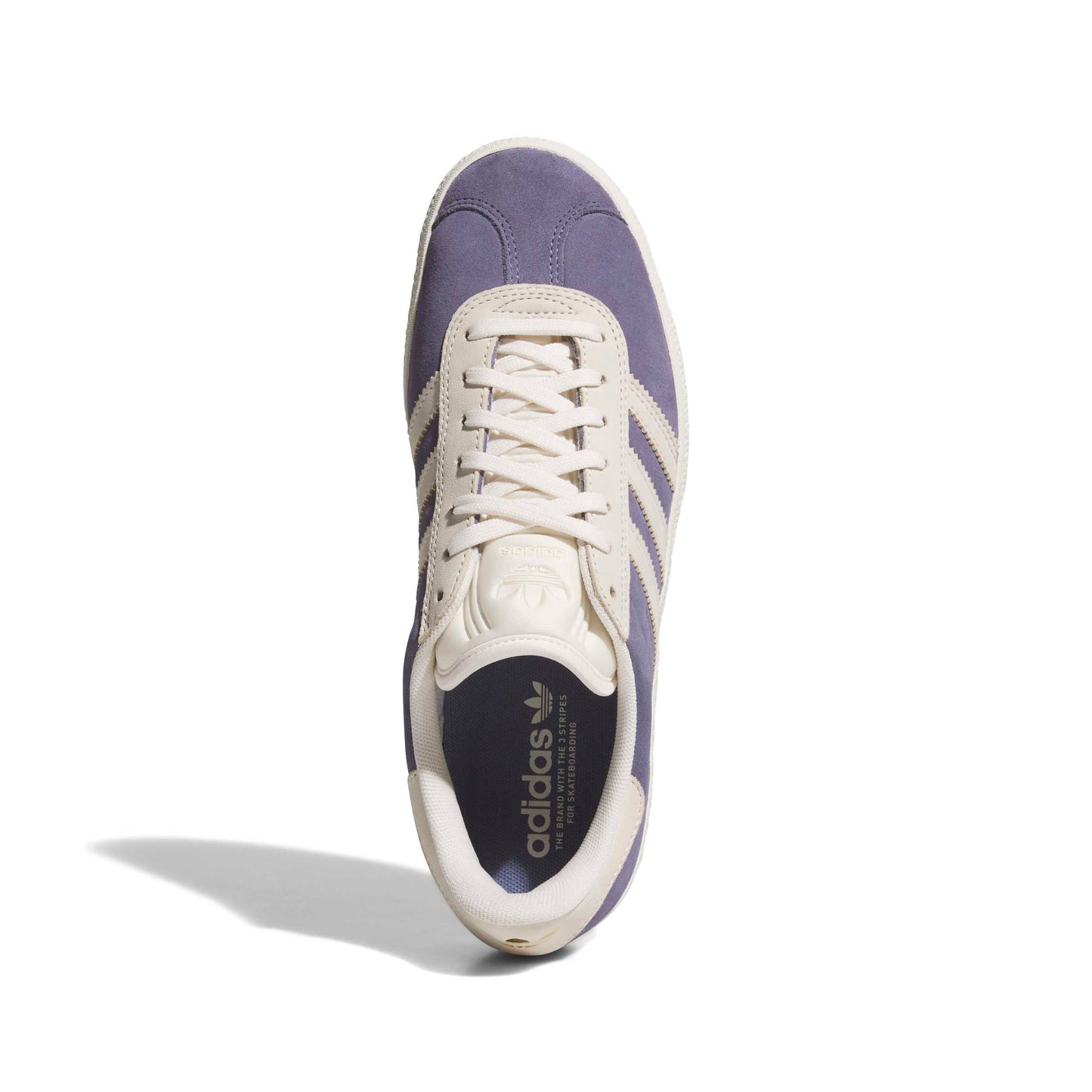 top down view of Purple and white Adidas sneaker on a white background