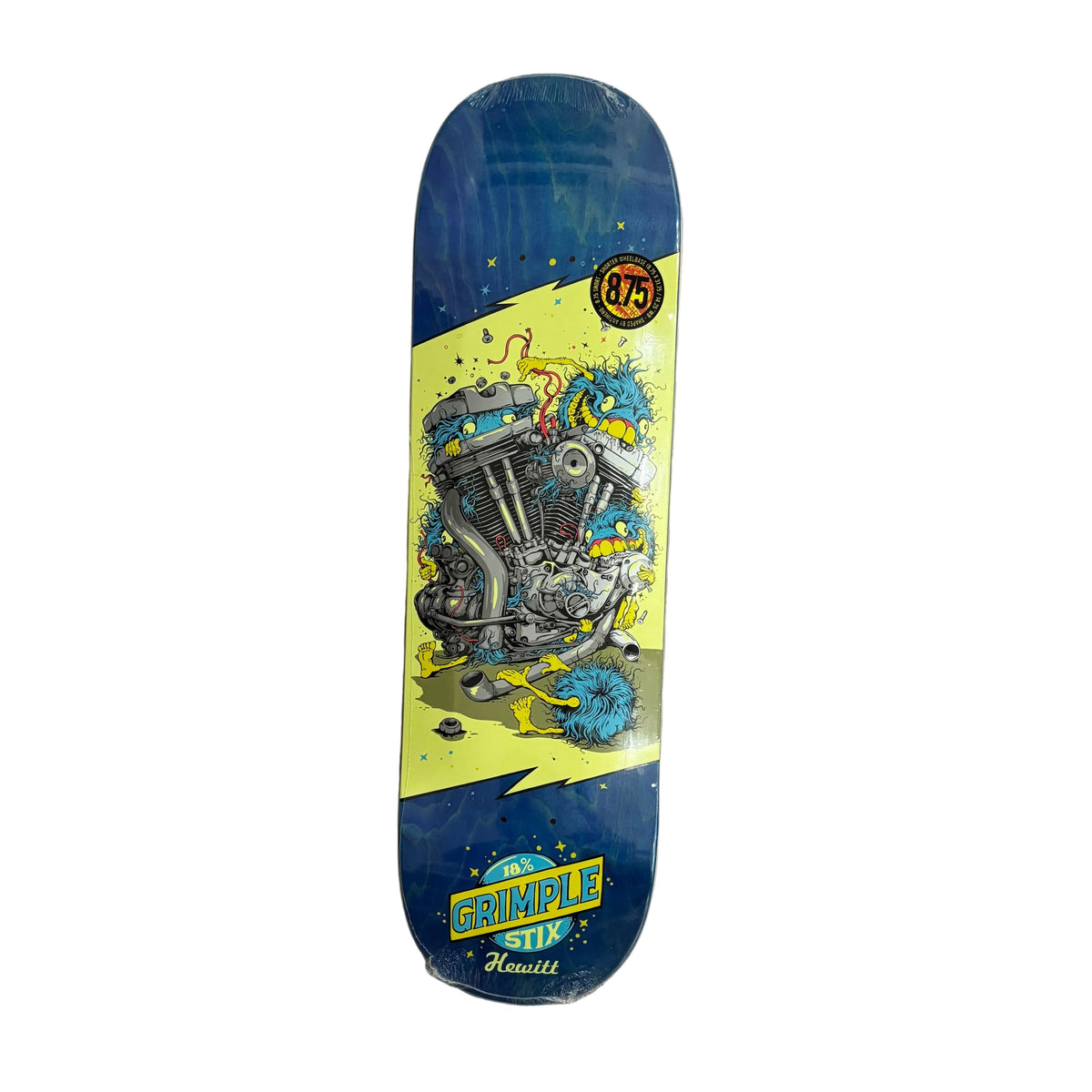 A Grimple stix skateboard deck featuring a blue and yellow graphic design with a motorcycle engine illustration, photographed on a white surface. 