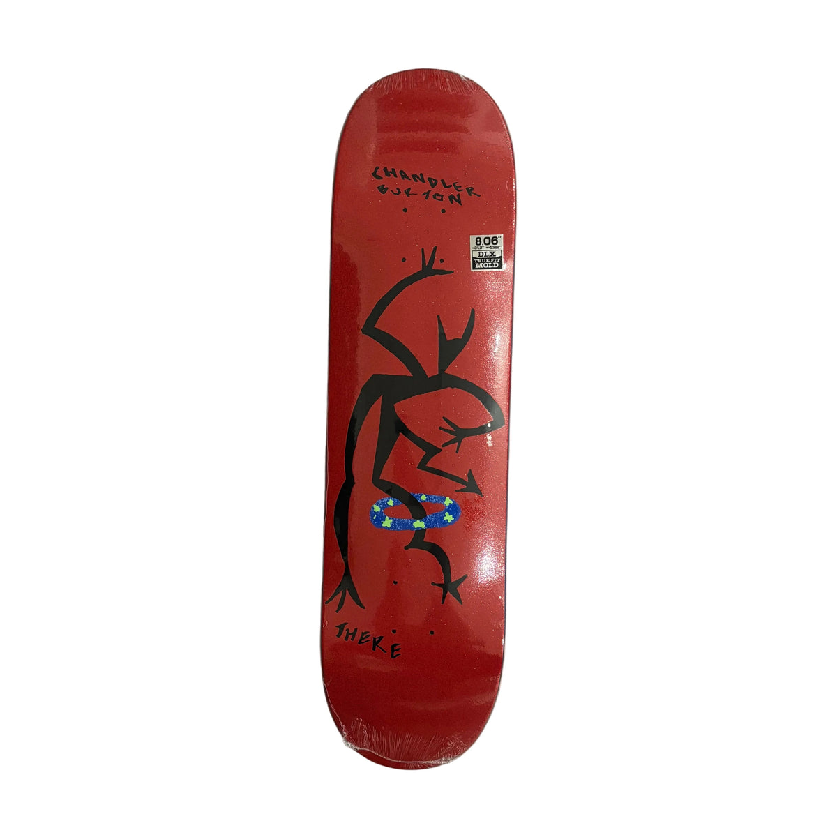 A red skateboard deck with a black frog graphic and a small blue-and-white patterned accent, photographed from above on a white background