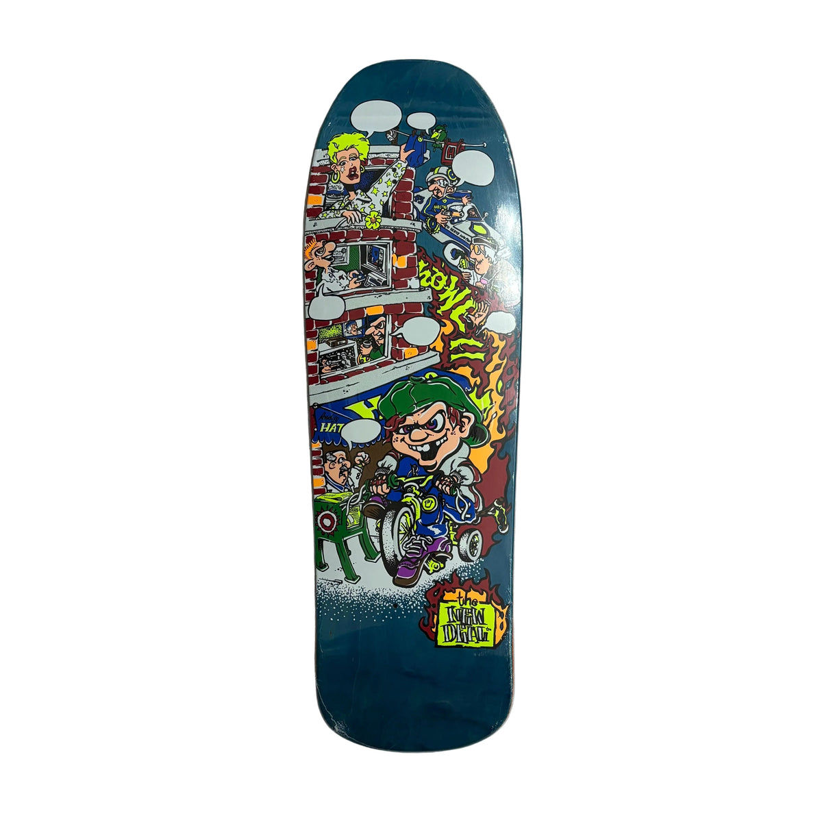 A skateboard deck featuring a colorful comic-style illustration of characters on a dark blue background, photographed from above on a white surface.