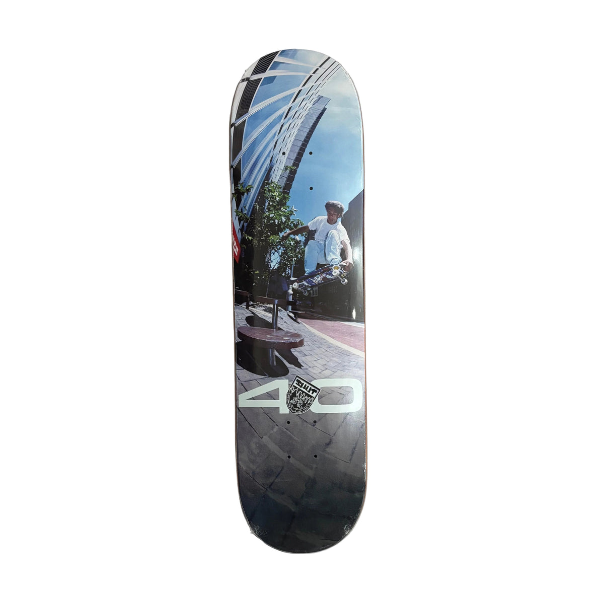 photo graphic on skateboard deck longways shown on a white background