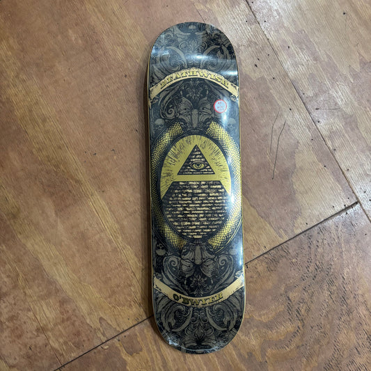Gold and black/grey pyramid conspiracy theory esque looking graphic on skateboard deck