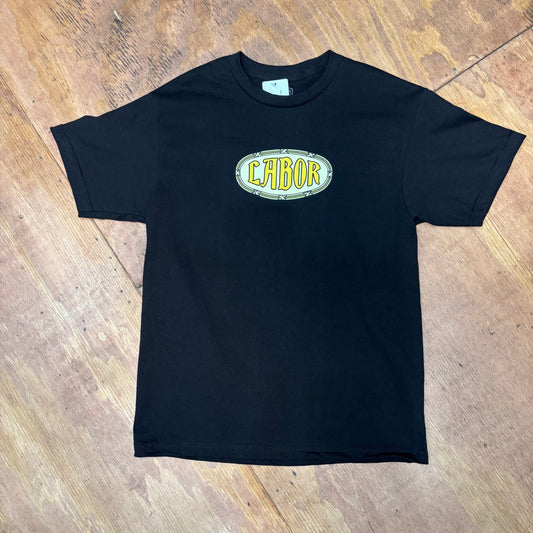 view of black t-shirt with cream and yellow oval LABOR logo