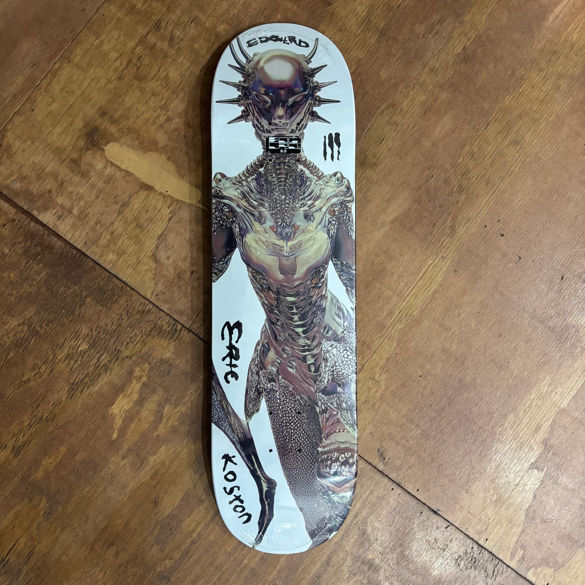 alien sci fi character on white background skateboard deck