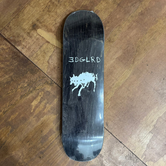 black woodgrain deck with white three headed wolf printed in the middle