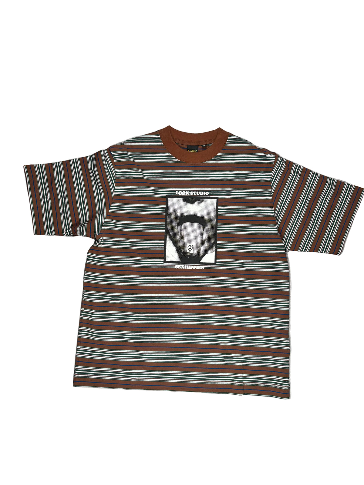 A short-sleeve striped t-shirt with brown, black, and teal horizontal stripes, featuring a central graphic print of a mouth with a tongue sticking out. The shirt is laid flat on a white surface.