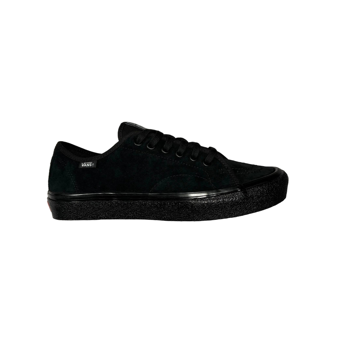 A black low-top sneaker with a suede and leather mix upper, black laces, and a thick black platform sole, shown from the side against a white background.