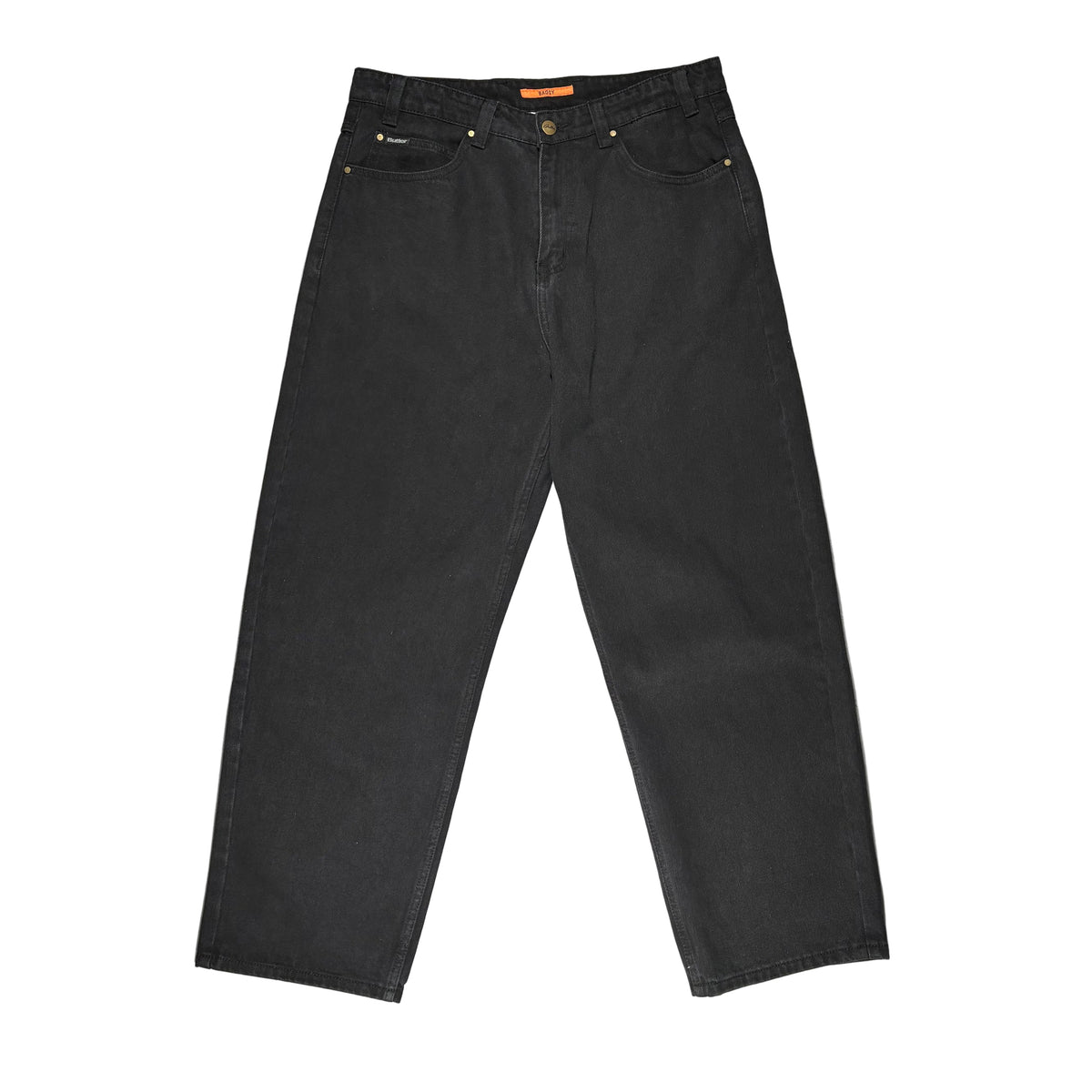 Black denim jeans laid flat on a white surface.