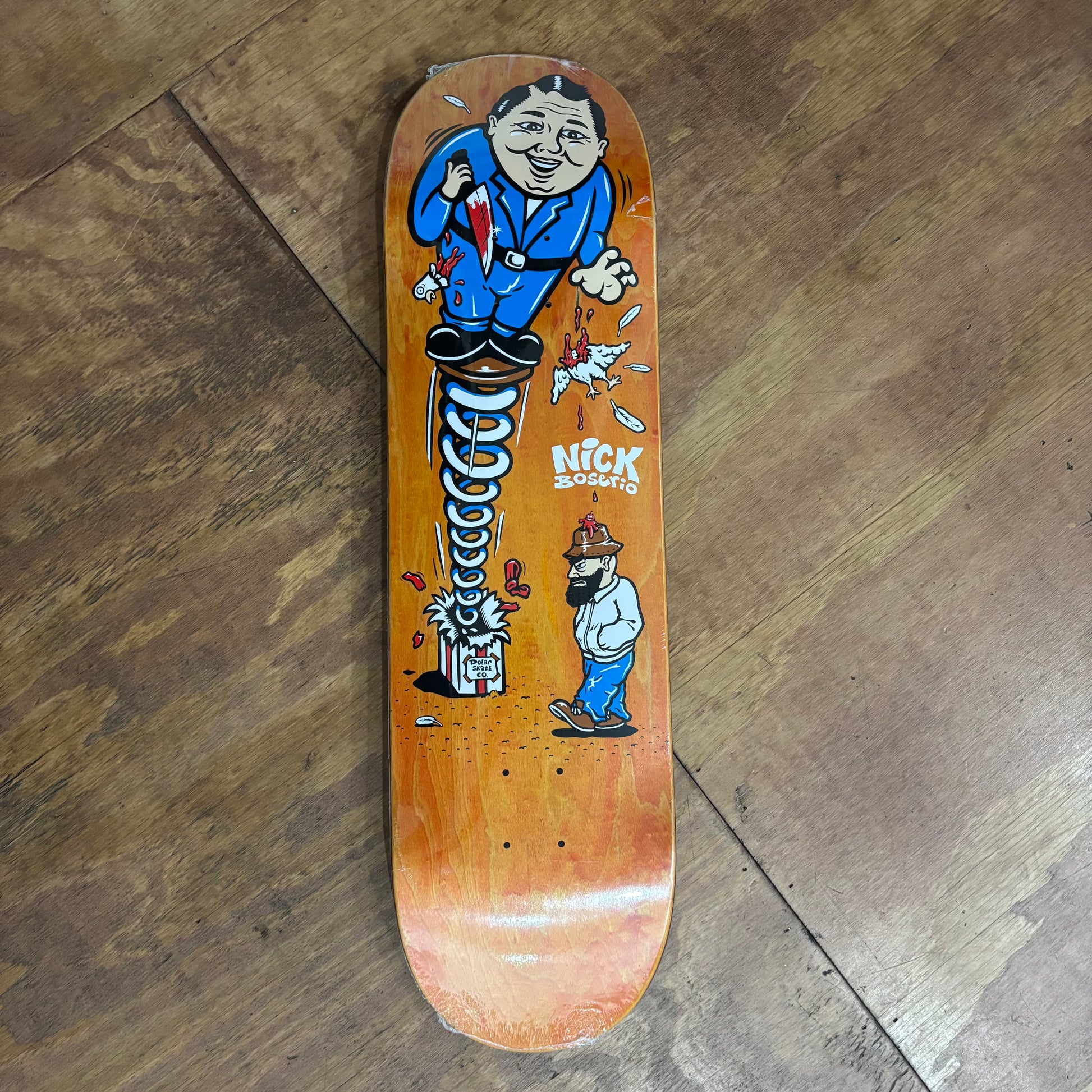 man on spring jumping out of box on woodgrain deck
