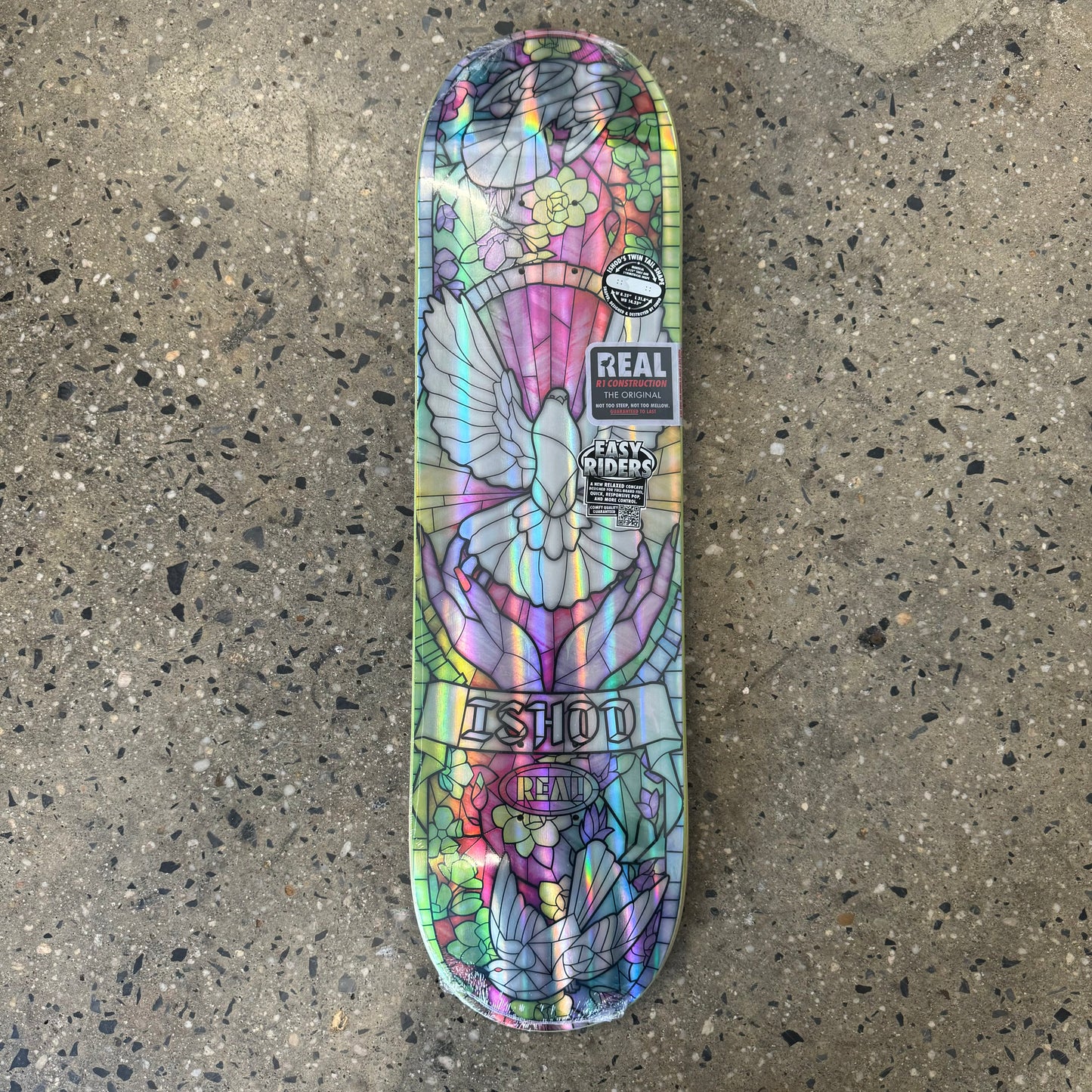 holographic multi colored skateboard deck with a bird in the center