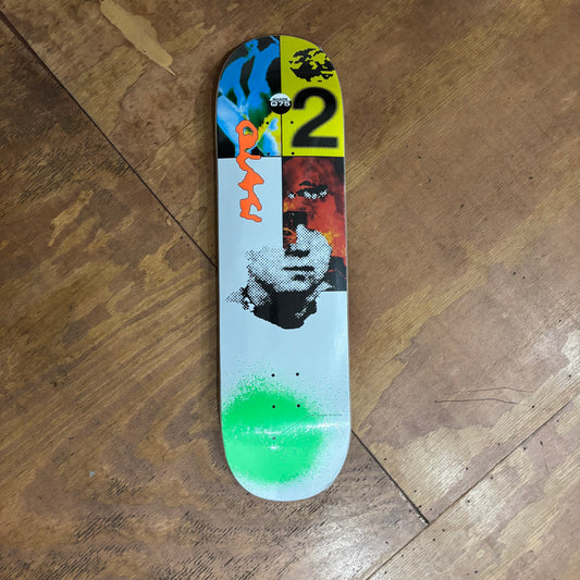 skateboard deck with multi color collage style graphic