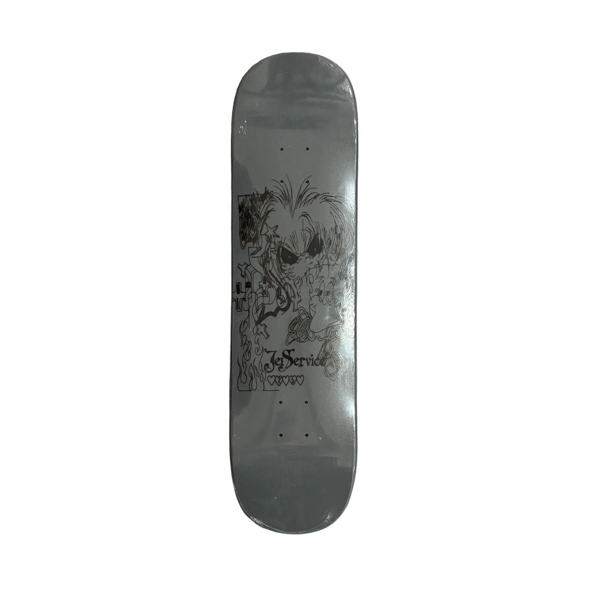 A gray skateboard deck with a black graphic of a skull and flowers, featuring the text 'Jet Service' photographed from above on a white surface