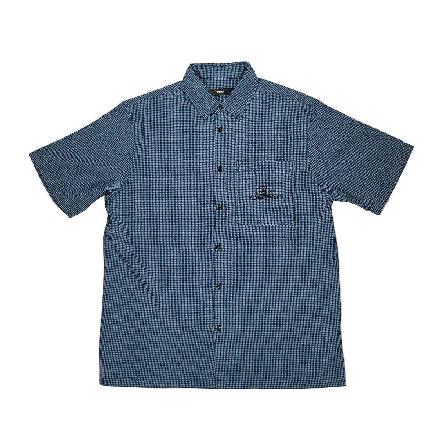 A short-sleeve button-up shirt in a blue and black micro-check pattern, laid flat on a white suface. The shirt features a chest pocket with a black embroidered logo on the left chest, and is photographed from a top-down.