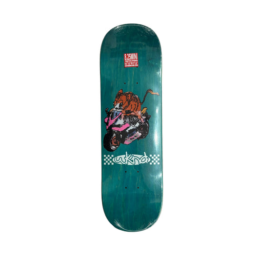 A teal skateboard deck with a graphic of a mouse riding a pink dirt bike, featuring the 'WKND' brand logo and text, displayed on a white surface.