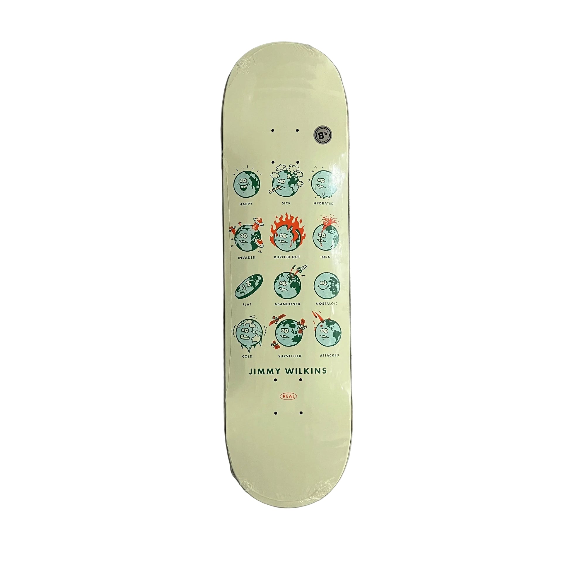 A vintage-style skateboard deck with a pale yellow-green background and a graphic of circular faces in green, red, and black, with 'JIMMY WILKINS' printed at the bottom, photographed flat on a white surface.