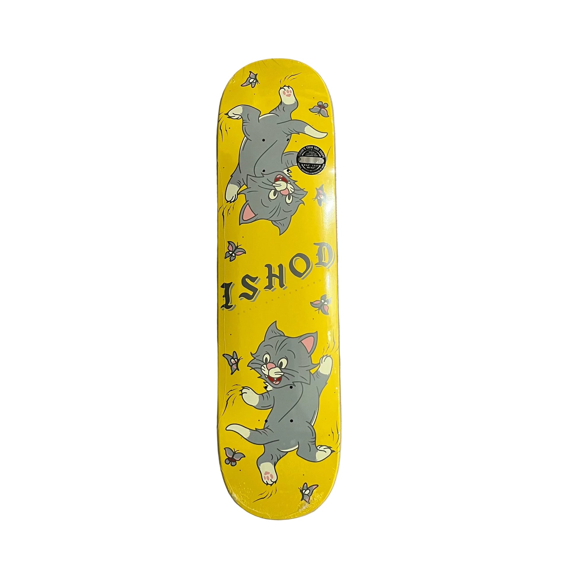 A skateboard deck with a bright yellow background featuring cartoon cat illustrations and the word 'ISHOD' printed across the center, photographed from above on a white surface.
