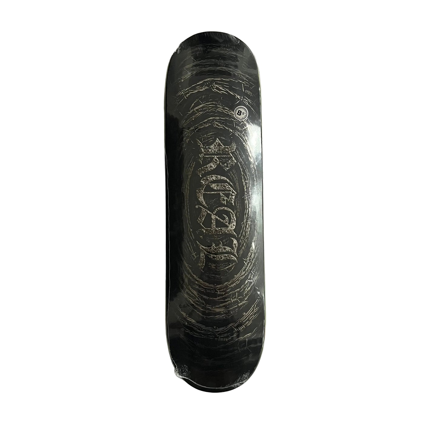 A black skateboard deck with a distressed silver graphic design, shown flat on a white surface.