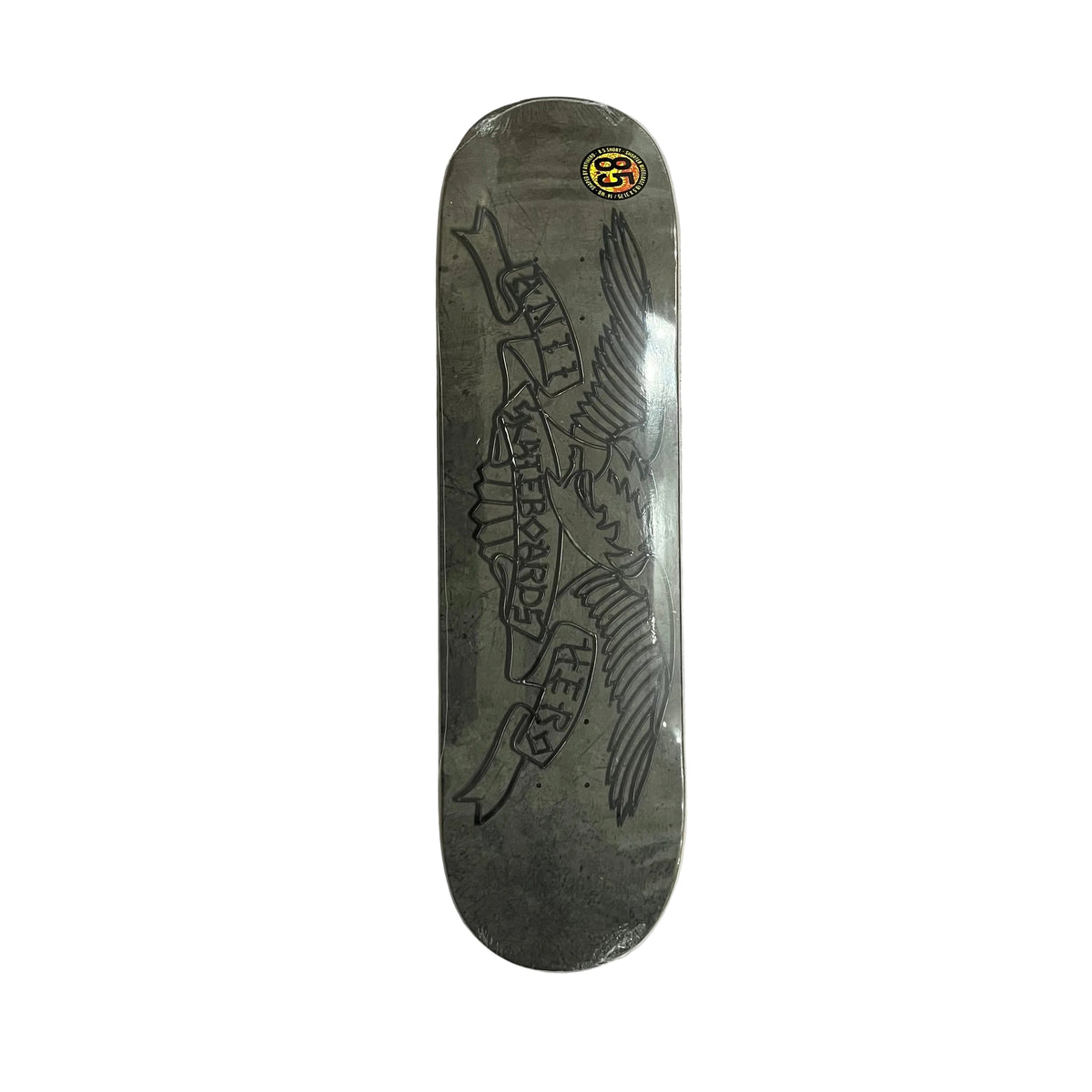 A dark gray skateboard deck with a distressed eagle graphic and the words 'ANTI HERO SKATEBOARDS' on a white surface.