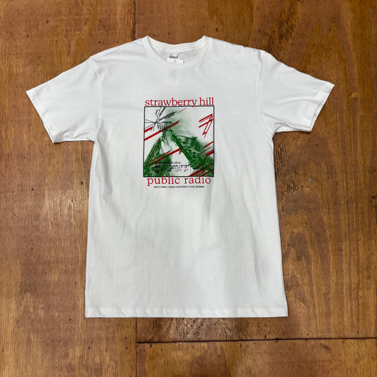 front view of strawberry hill public radio graphic on center chest of white t-shirt