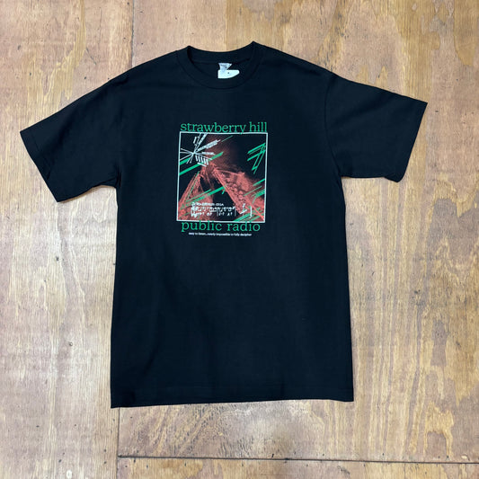 black t-shirt with STRAWBERRY HILL public radio graphic on center of chest