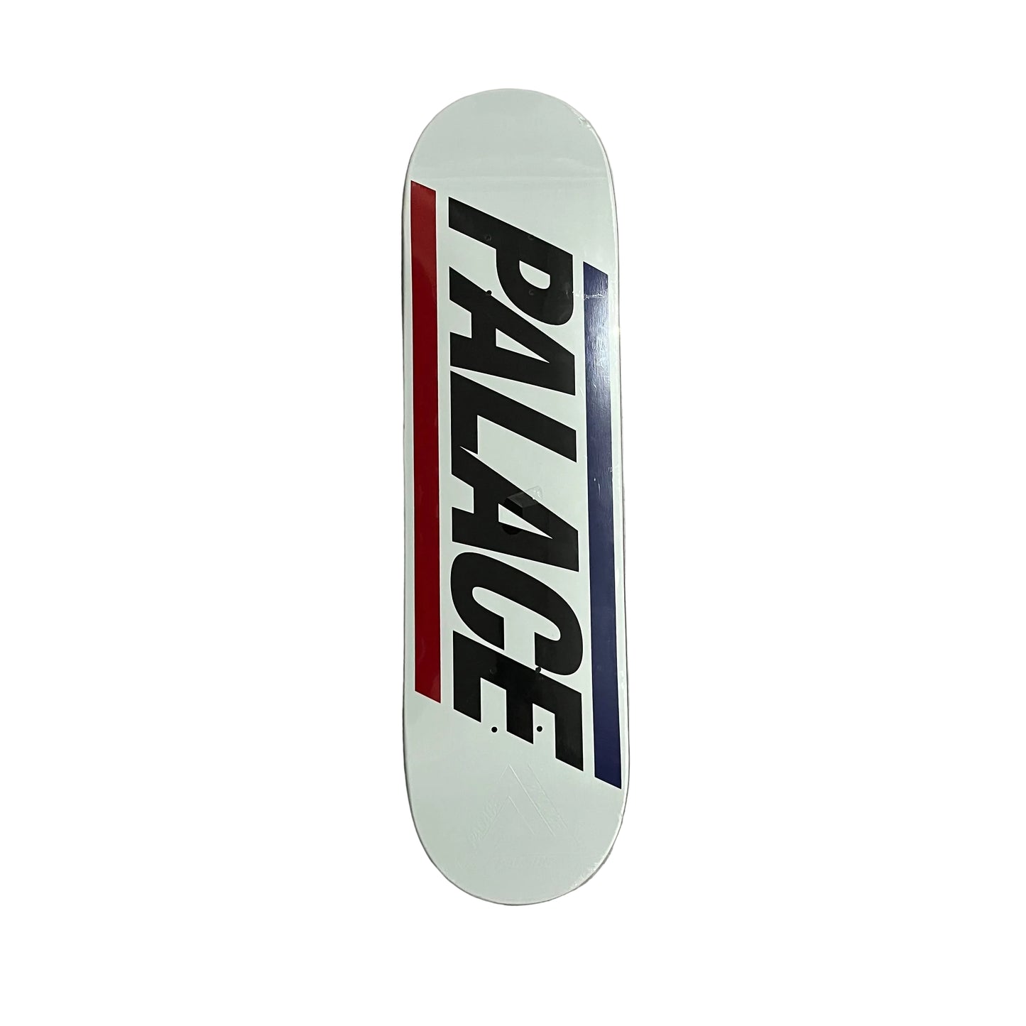 A white skateboard deck with the brand name 'PALACE' printed vertically in black, flanked by red and navy blue stripes, shown on a white surface.
