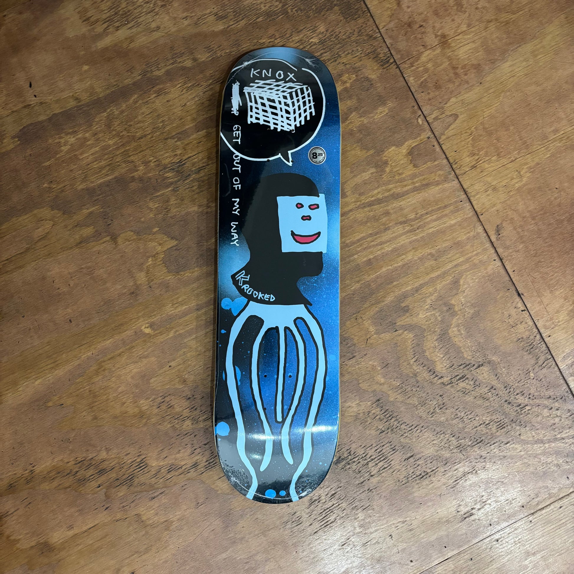 hand drawn squid on blue spray style skateboard deck