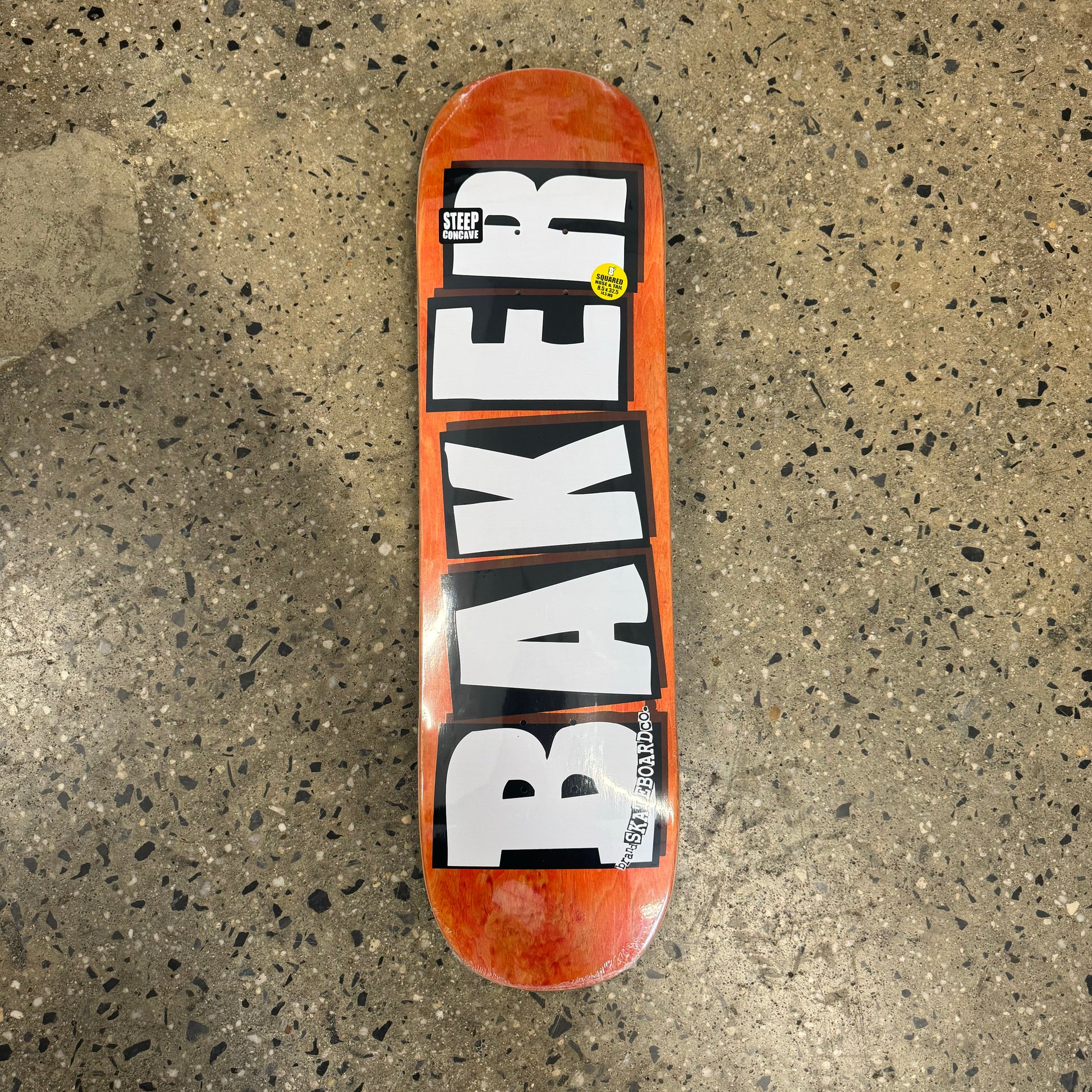 skateboard with baker logo and assorted wood veneers