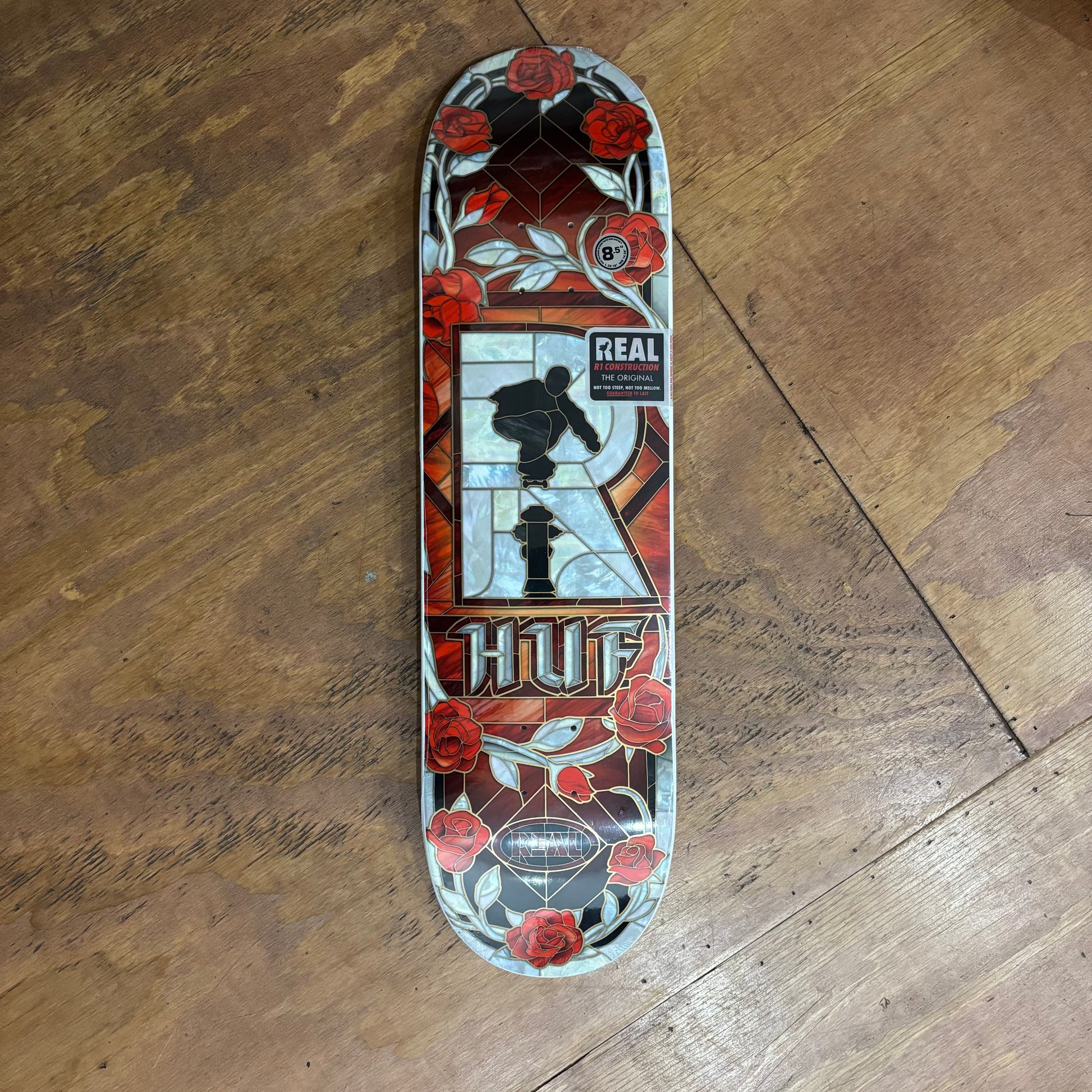 stained glass style graphic of iconic HUF logo of Keith Hufnagel jumping over a fire hydrant
