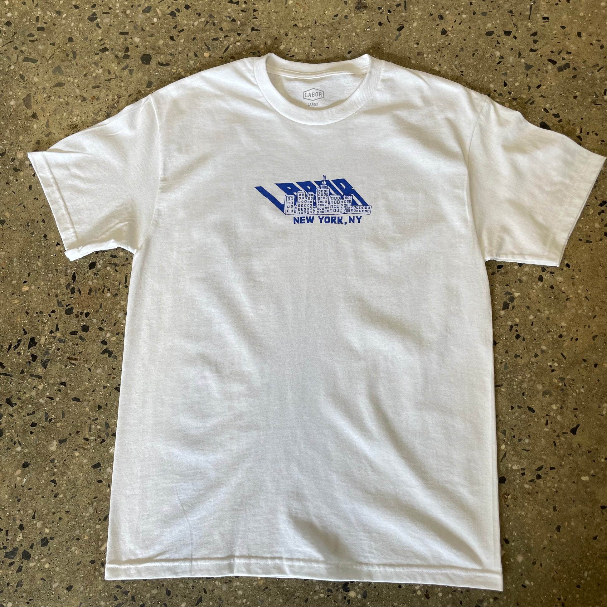 Blue labor skyline logo graphic in royal blue printed on white t-shirt