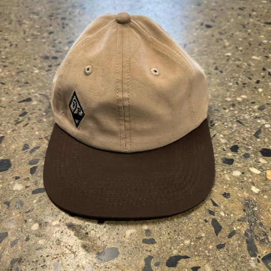 sand hat with brown bill and logo