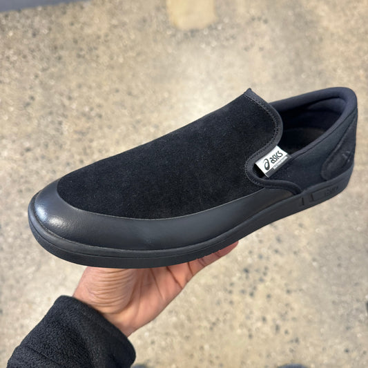 black suede slip on sneaker with black sole, side view