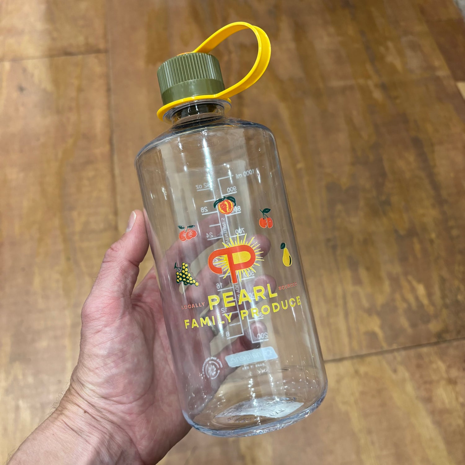 photo of water with PEARL FAMILY PRODUCE printed on bottle