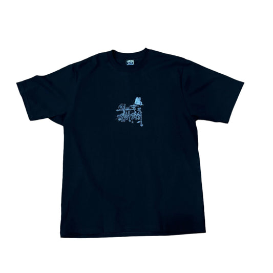 front of black t-shirt with floral esque logo printed in the center of chest