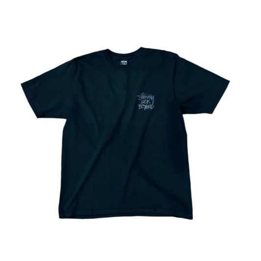 front view of black t-shirt with STUSSY LOOK BEYOND printed on left chest