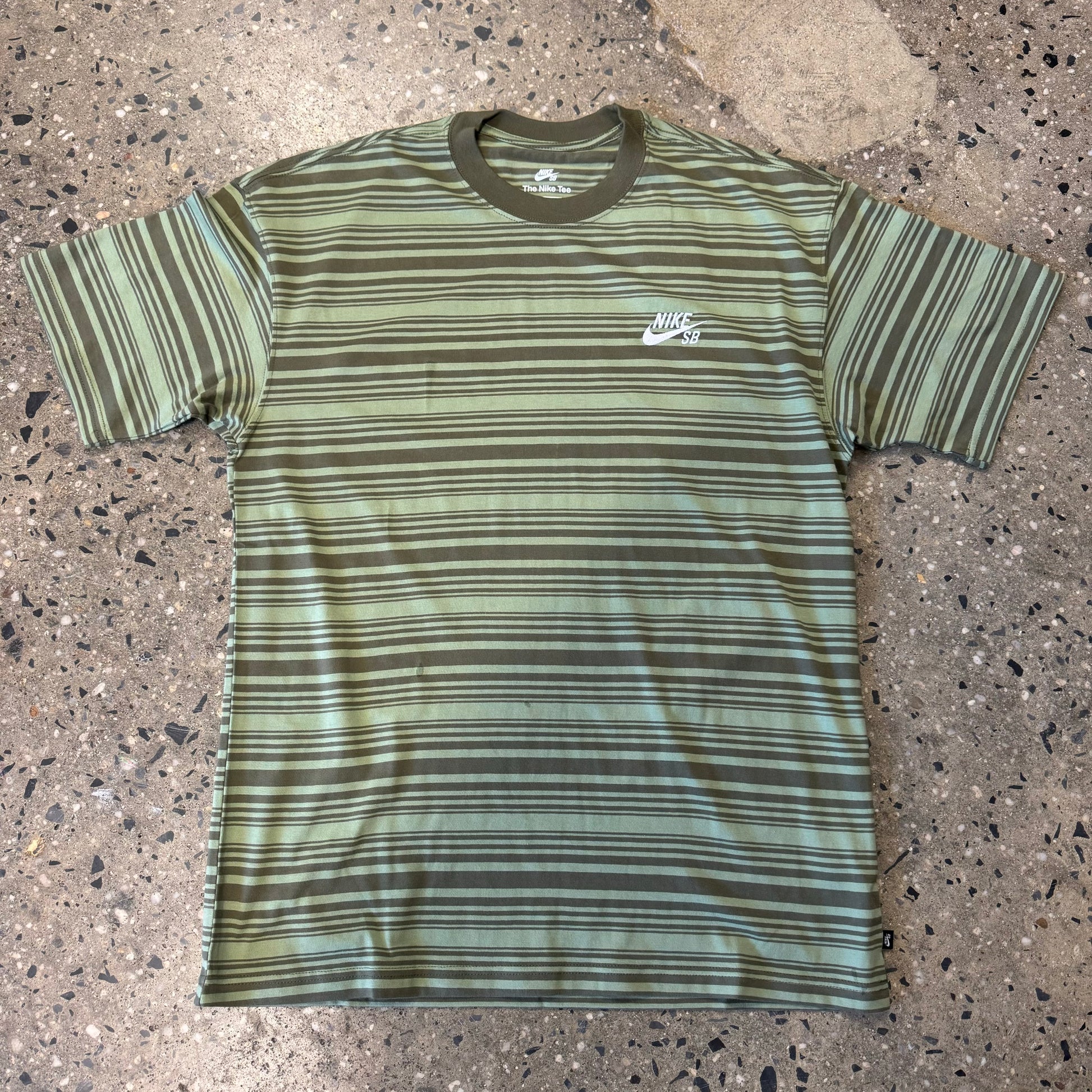green striped T-shirt with white logo