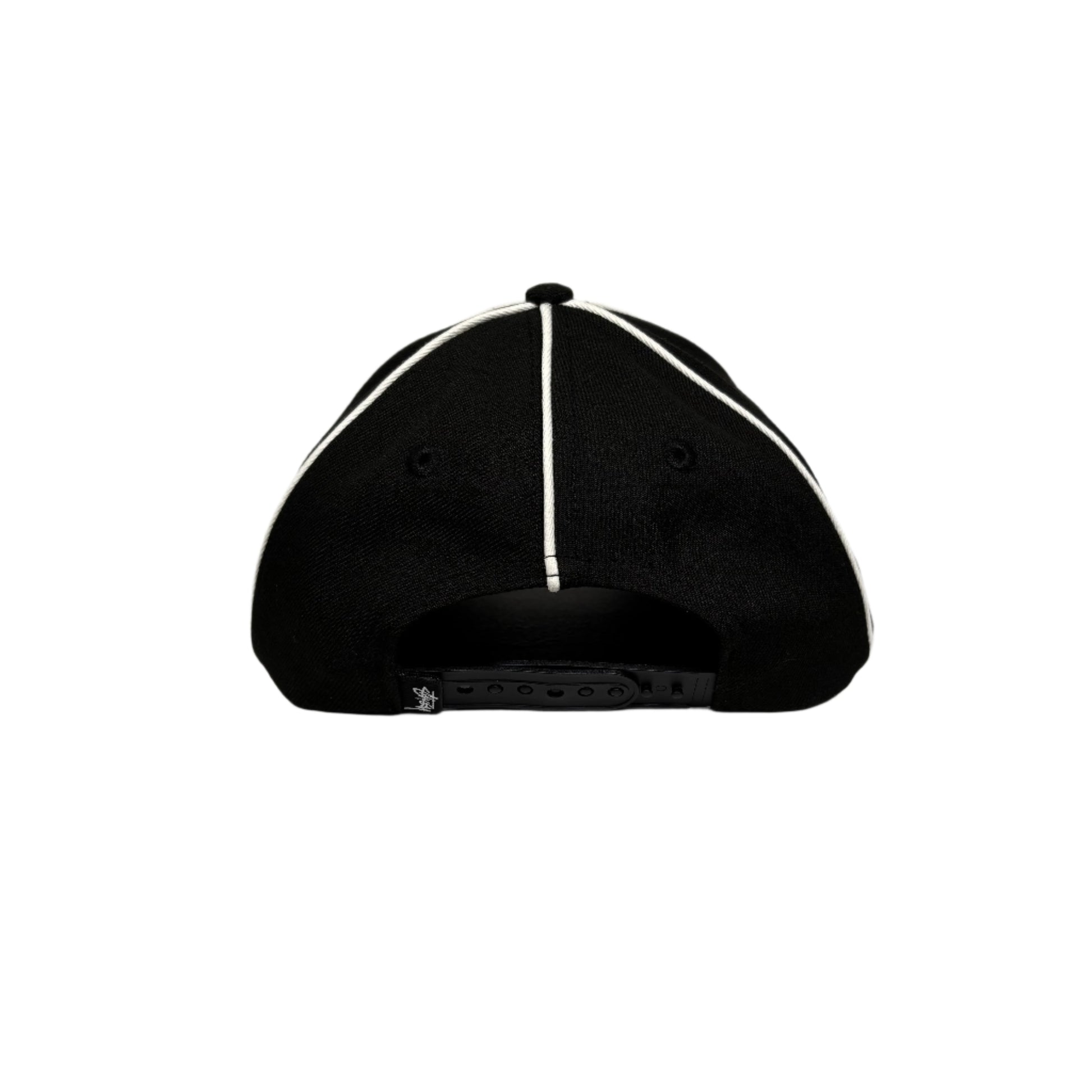 view of black cap with white piping