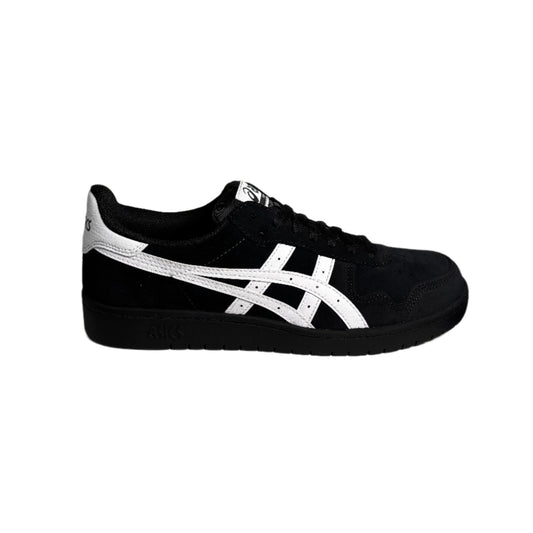 side view of black/white suede lowtop skate shoe