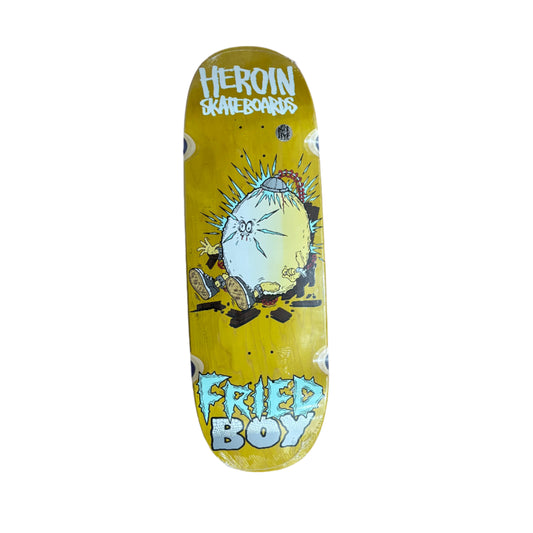 egg on yellow woodgrain skateboard with wheel wells