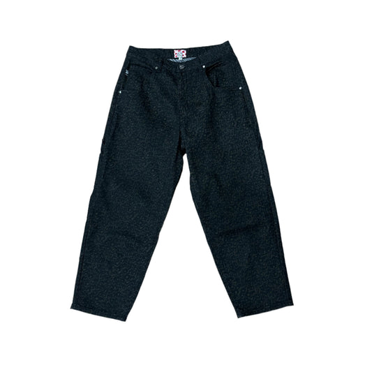 front view of leopard print on black denim jeans