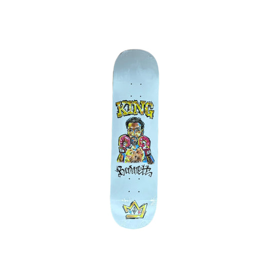 airbrushed artwork of boxer with KING and BARNETT printed on the deck