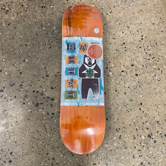 skateboard deck with a drawing of a bear and some text 