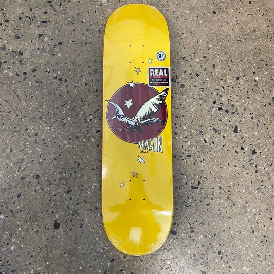 yellow skateboard with a drawing of a bird and stars