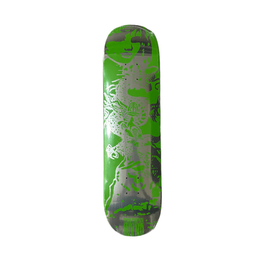 Green and black patterned skateboard deck on a white surface