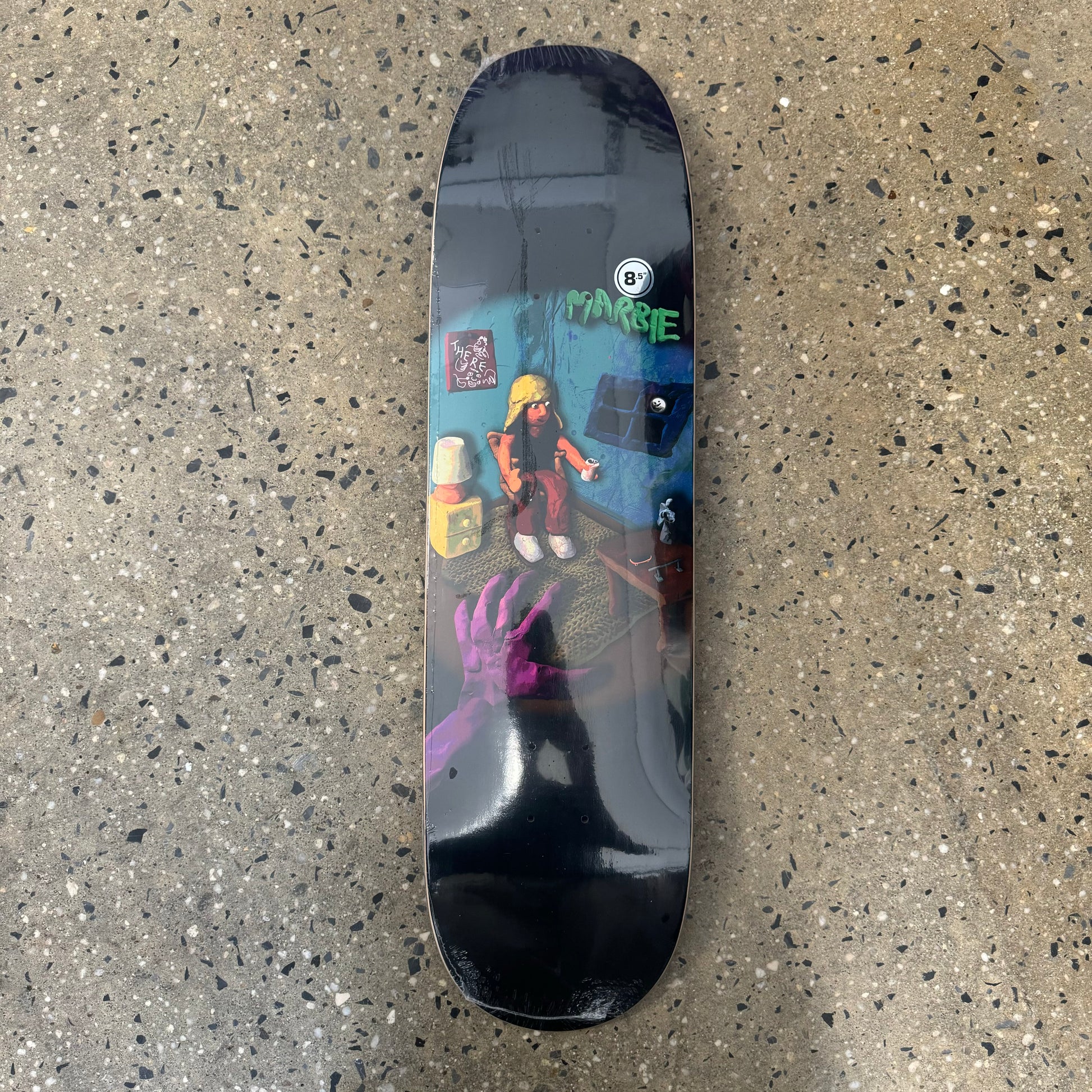 black skateboard deck with clay animation 